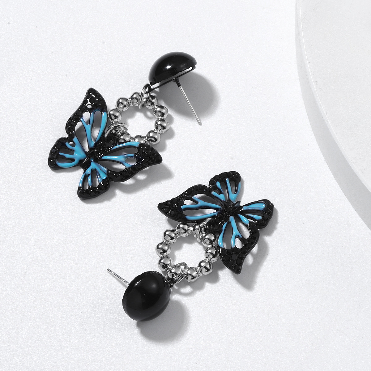 Nouvelle Mode Alliage Goutte Couleur De L&#39;huile Creux Papillon Boucles D&#39;oreilles En Gros display picture 3