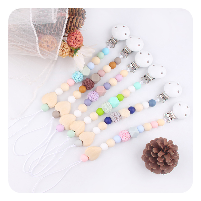Productos para bebés y niños pequeños grano madera amor DIY tetina cadena calmar bebés perlas de silicona mordida goma molar cadena de prevención