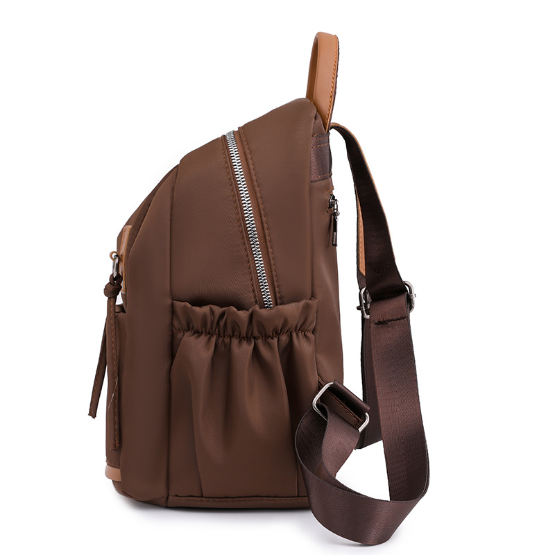 Spot al por mayor 2023 nuevo estilo casual damas Oxford mochila moda simple arte viajes mochila marea