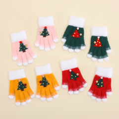 赤ちゃんのクリスマスツリーの手袋秋の冬の5本の指のニットの防寒の中で子供の室外の学生の6-10歳は指を分けます。