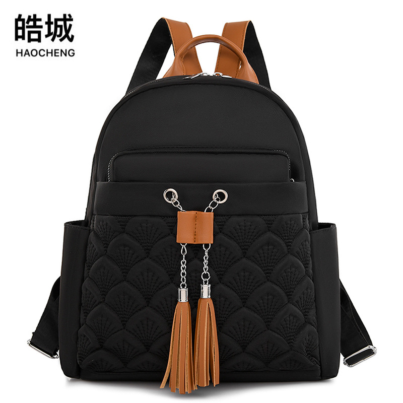 Bolsos para mujer 2023 nuevas señoras mochila de tela Oxford moda borla color de contraste mochila de viaje mochila escolar para estudiantes marea