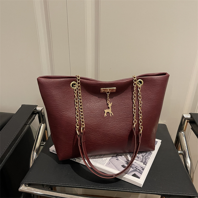 Bolsas de gran capacidad de mujeres de este año, cadenas de moda populares de hombro de alto nivel, bolsas de transporte polivalentes extranjeras