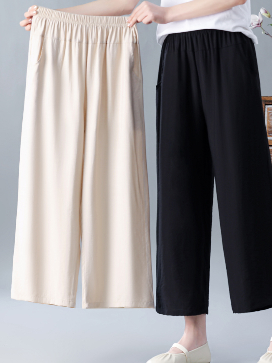 お母さんは夏のストレートズボンの外に腰の9分のズボンの中の老年の婦人服を着て肉の大きいサイズの純色のズボンを遮ります。