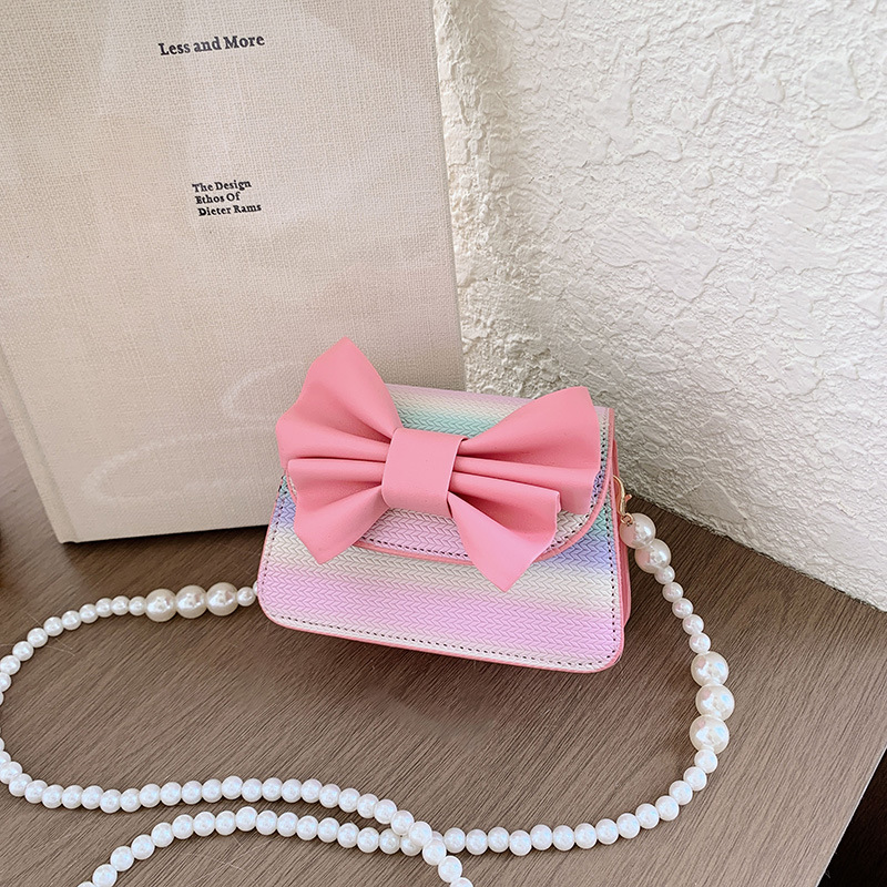 Cross-border children's bag 2026 new model colorful laser bow girls' shoulder bag with pearl chain and lipstick holder crossbody bag