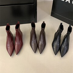 先の尖った韓国のショートブーツの女性のスリーブの方と女性のブーツのネットの赤い太さとやせている靴の小さい大衆の設計のハイヒールのマーティンの靴