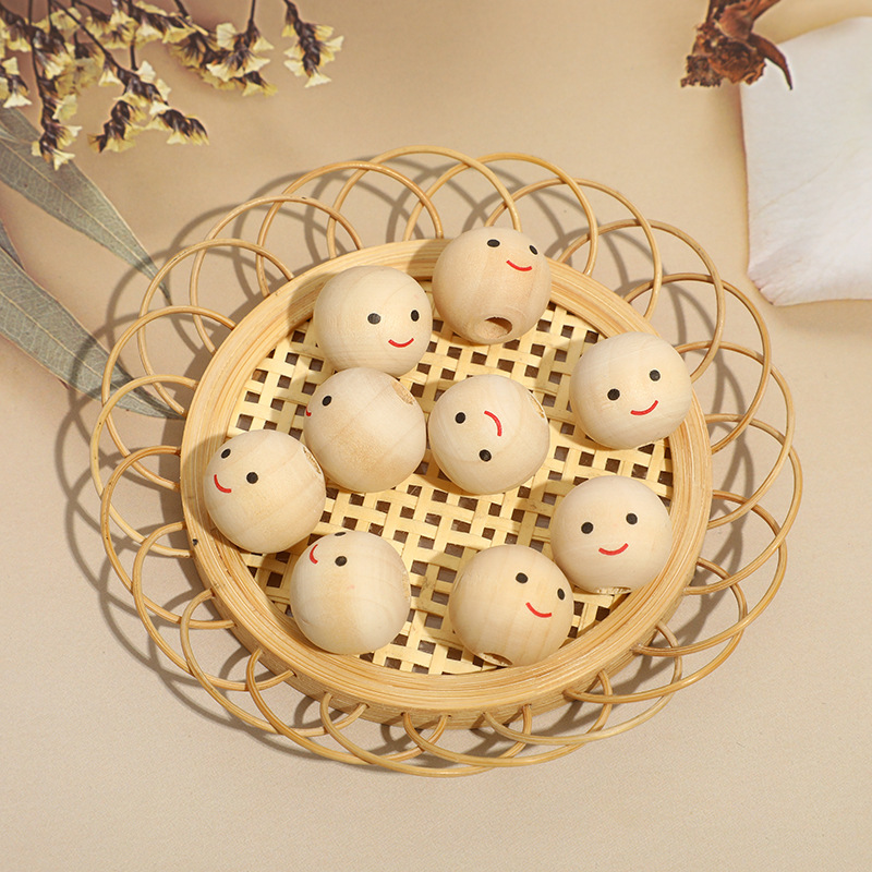 Hemu Smiley cara muñeca cabeza DIY productos hechos a mano Accesorios transfronterizos Venta caliente cara sonriente cuentas de madera