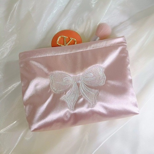 Fresh embroidered bow portable cosmetic bag, portable large-capacity liner storage bag, niche cloth