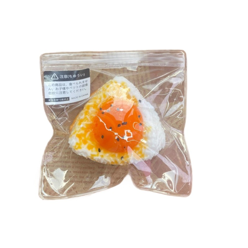 Explosión triángulo salado de arroz de yemas de huevo pellizco Le descompresión rebote lento juguetes de silicona simulación de comida jugar