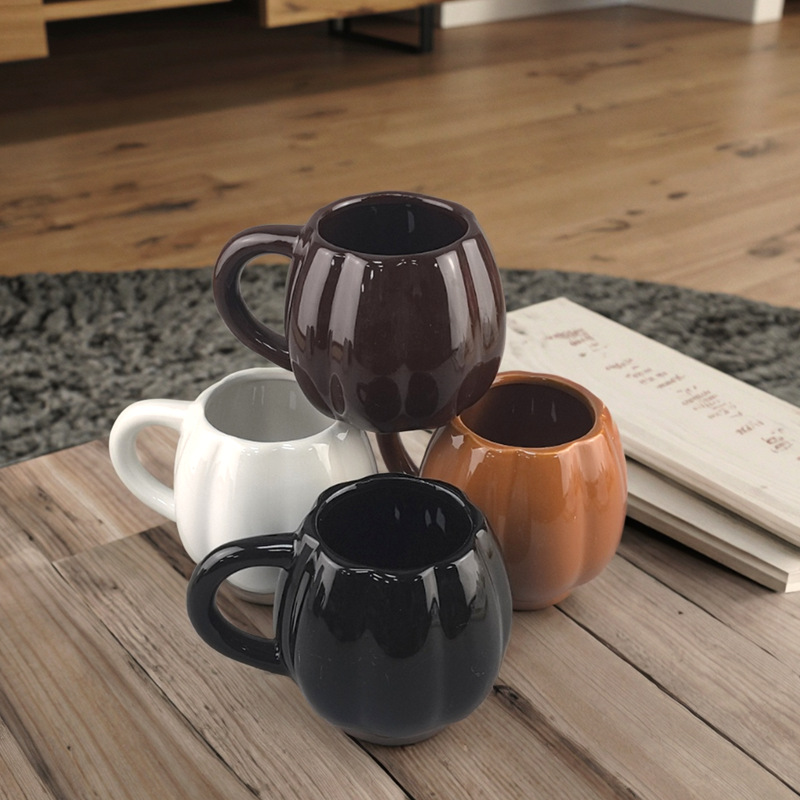 Fábrica al por mayor de tazas de cerámica de Halloween en forma de calabaza taza de agua LOGO taza de café de cerámica