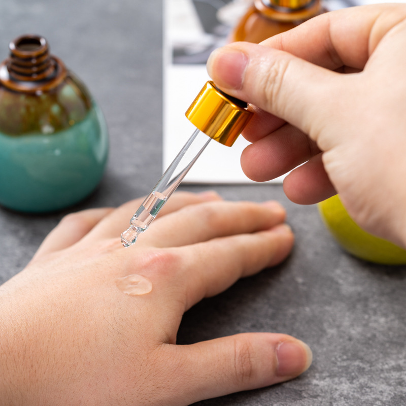 Cuentagotas de vidrio de alta calidad Esencia de aceite esencial de cerámica Cuidado de la piel botella salón de belleza spa tailandés aromaterapia spa botella de despliegue