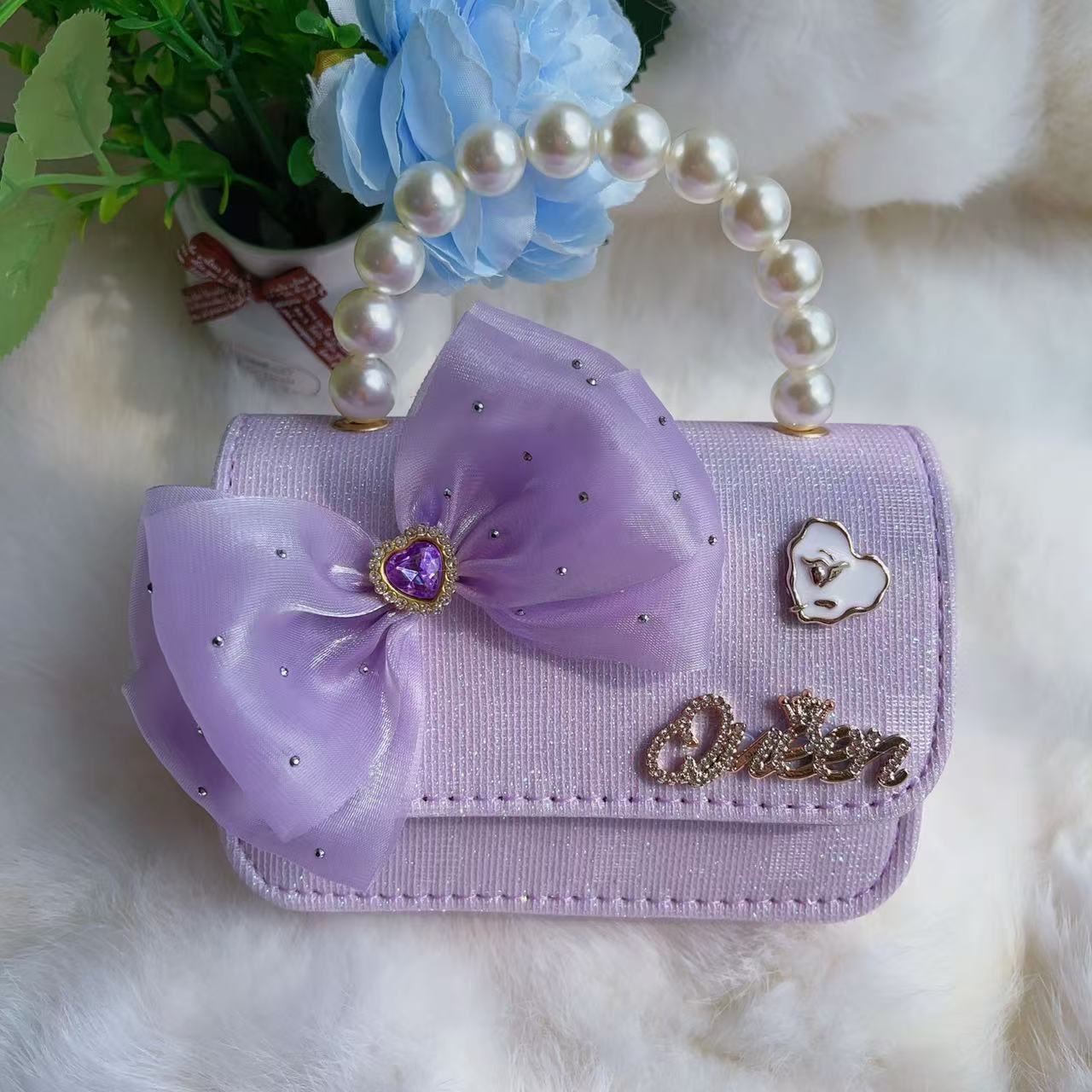 Nuevo tipo de bolsos para niños, bolsos de moda, bolsos de princesa de viento, bolsos portátiles lindos para chicas, bolsos de red para bebés.