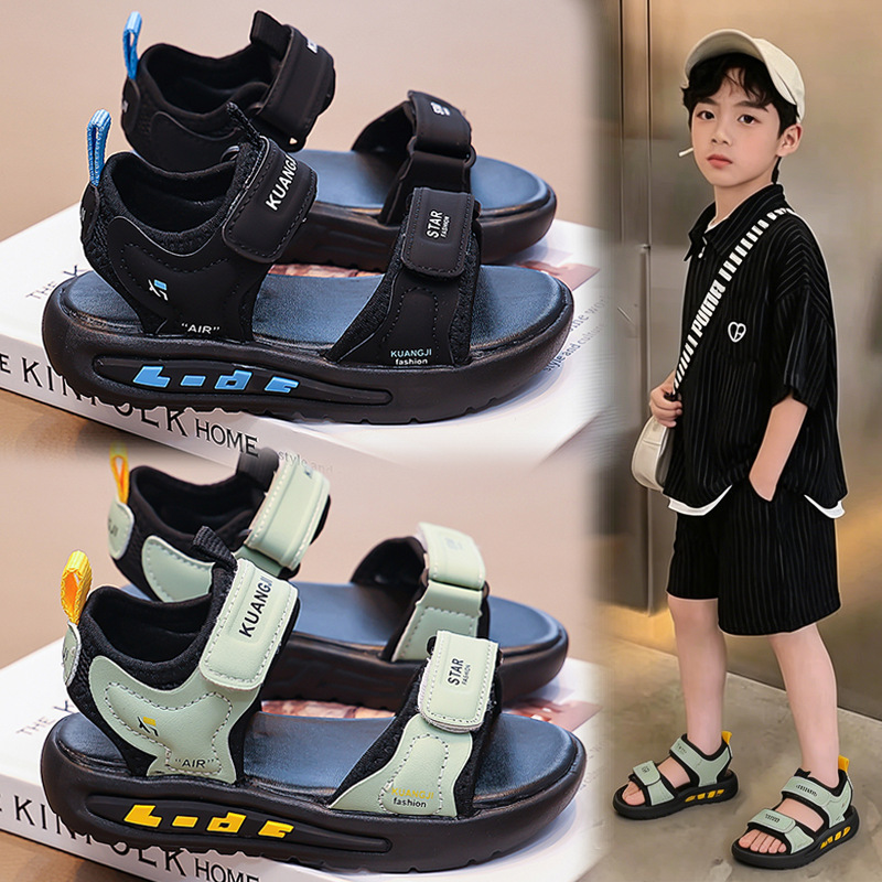 Niños huecos zapatos de playa de dedo abierto 2026 verano nuevo estilo de moda infantil sandalias versátiles sandalias de niños mayores
