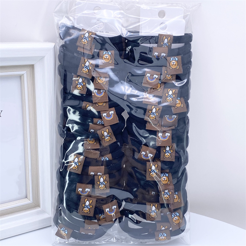 2022 nuevo estilo coreano accesorios para el cabello leche té color Banda para el cabello sin costuras etiqueta de tela Linda cuerda para el cabello 3 tarjetas cabeza cuerda banda de goma