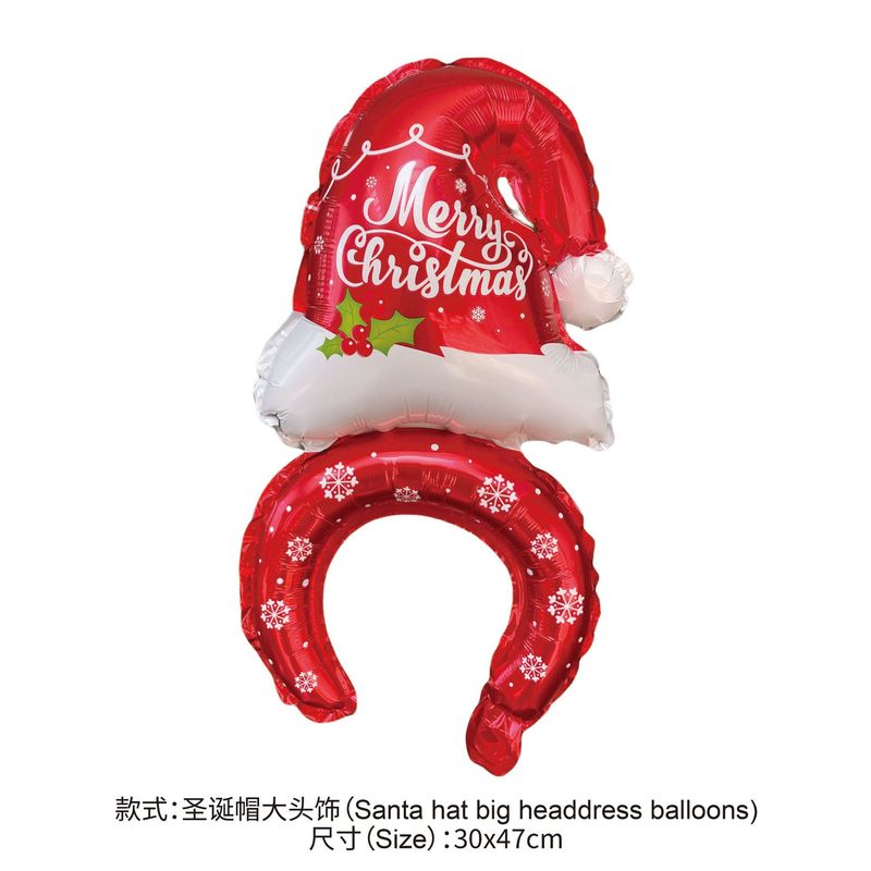 クリスマスのクリスマスツリーの老人雪だるまは棒のカチューシャの装飾品を持っています。|undefined