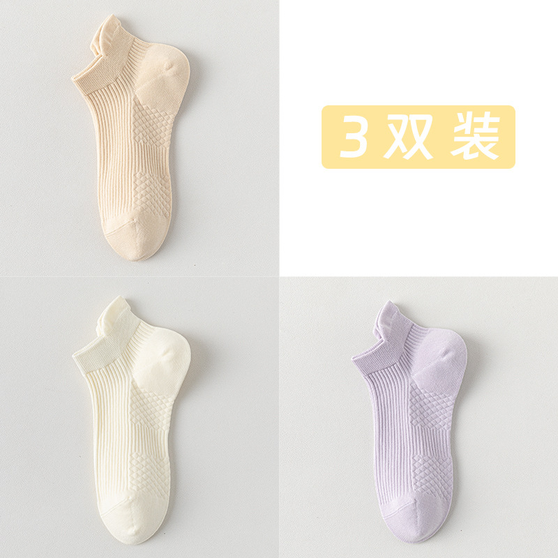 Calcetines de barco para mujeres, calcetines de primavera y verano, calcetines de algodón de color sólido, calcetines de algodón resistentes a las bolas, calcetines de embalaje independientes sin costuras.