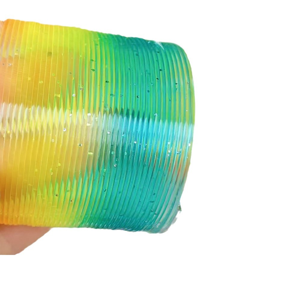 Juguetes para niños anillo de arco iris de forma especial anillo elástico bobina anillo superpuesto regalo para jardín de infantes para niños y niñas puzzle