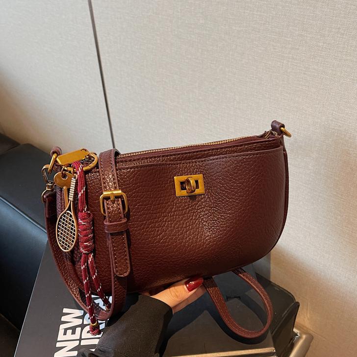 Bolso de explosión de comercio exterior para mujeres 2025 nuevo estilo universal retro de alta sensación bolso de hombro de moda universal bolso de hombro