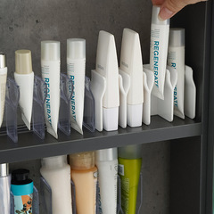 Wholesale Wall Mountable Makeup Storage Shelf for Cleanser, Toothpaste, and Cosmetics - Clip-on, No Drilling Bathroom Drainage Rack