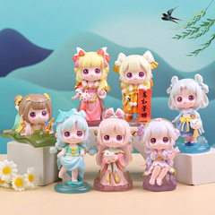 国の潮の風の時に春風の盲の箱の公の子供の手に会って装飾品を飾ってファッションの人形の事務のデスクトップの装飾品を並べます。