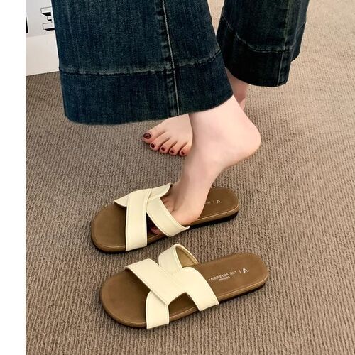 Everyday versatile soft-soled, comfortable cross-strap sandals—perfect for summer, ideal with skirts, and great as flat beach shoes.