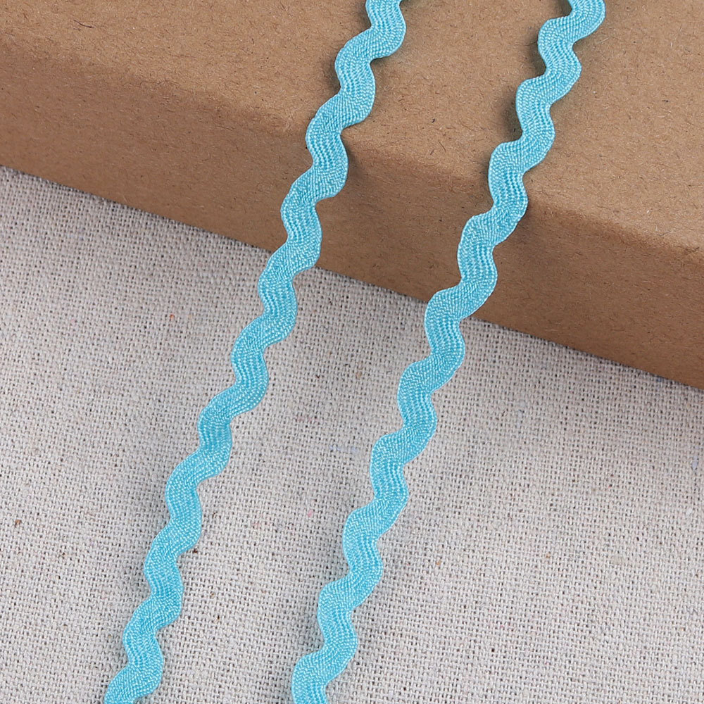 Cinta de polipropileno en S de 5mm, embalaje de regalo, cinta ondulada de color para el hogar, cinta de borde curvo al por mayor