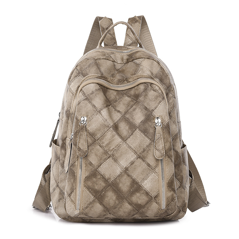 Spot al por mayor 2023 nueva mochila de cuero suave para mujer retro casual moda rombo urbano simple mochila marea