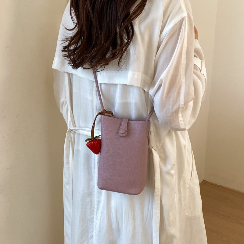Nuevo mochila ligero verano 2026 teléfono móvil cuero suave versátil cubo de transporte mini mochila de hombro mujer estilo coreano