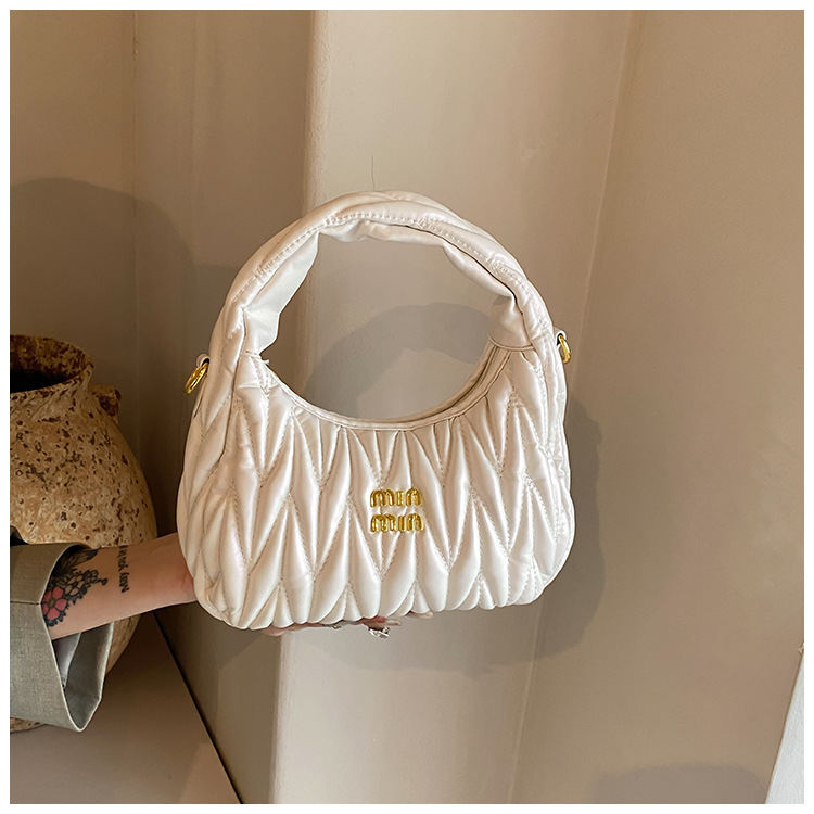 Bolsos de todo fósforo 2024 moda de verano textura plisada bolsa de axilas bolso retro ins bolso femenino de moda simple