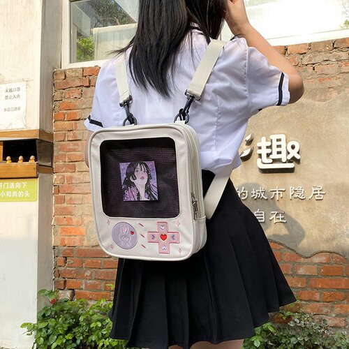 Japanese creative funny personality cute cute cartoon soft girl student game machine transparent pu backpack soft girl school bag