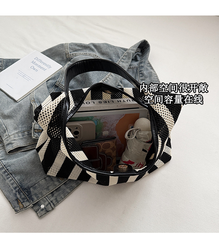 Korean summer new striped woven bag, casual vacation and laid-back style tote bag, hand and shoulder commuter tote bag undefined