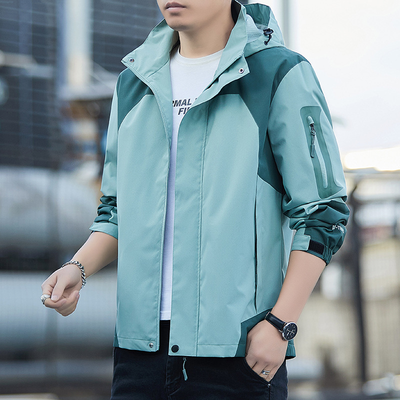 Nueva primavera y otoño chaqueta al aire libre pareja chaqueta a prueba de viento impermeable chaqueta con capucha Top montañismo ropa hombres al por mayor