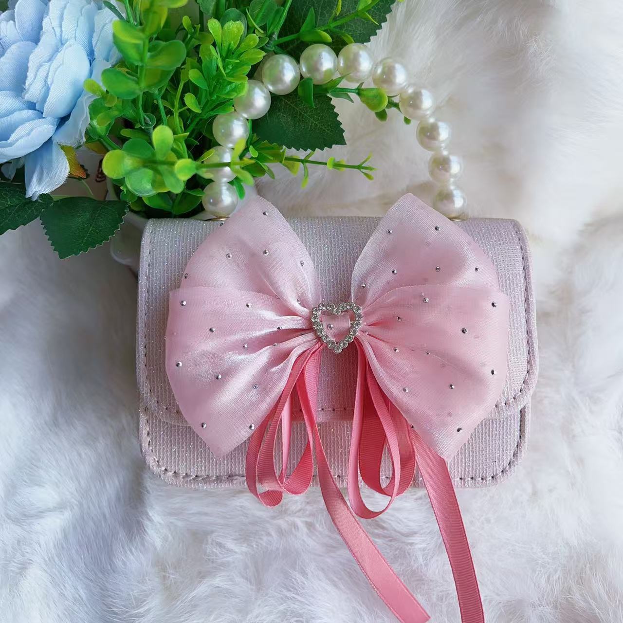 Bagos de perlas para niños 2025 nuevos bolsos de niños bolsos de mochila de niñas bolsos accesorios de princesa bolsos de viento de fragancia