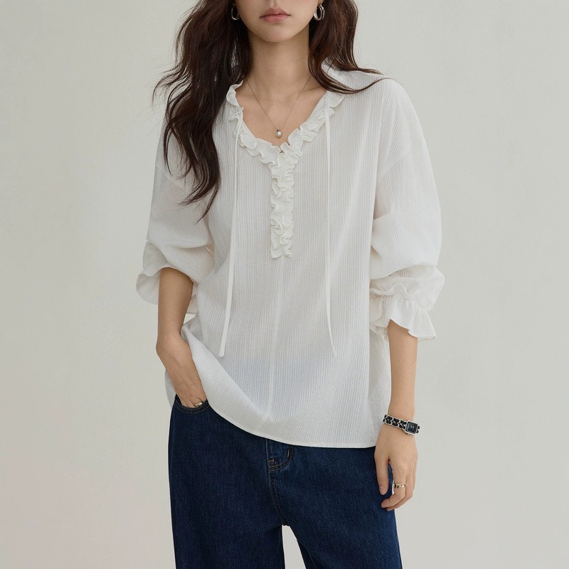 Joli Choose women's textured white V-neck shirt with ruffled trim and tie detail, mid-sleeve, gentle cotton shirt Joli Choose women's textured white V-neck shirt with ruffled trim and tie detail, mid-sleeve, gentle cotton shirt