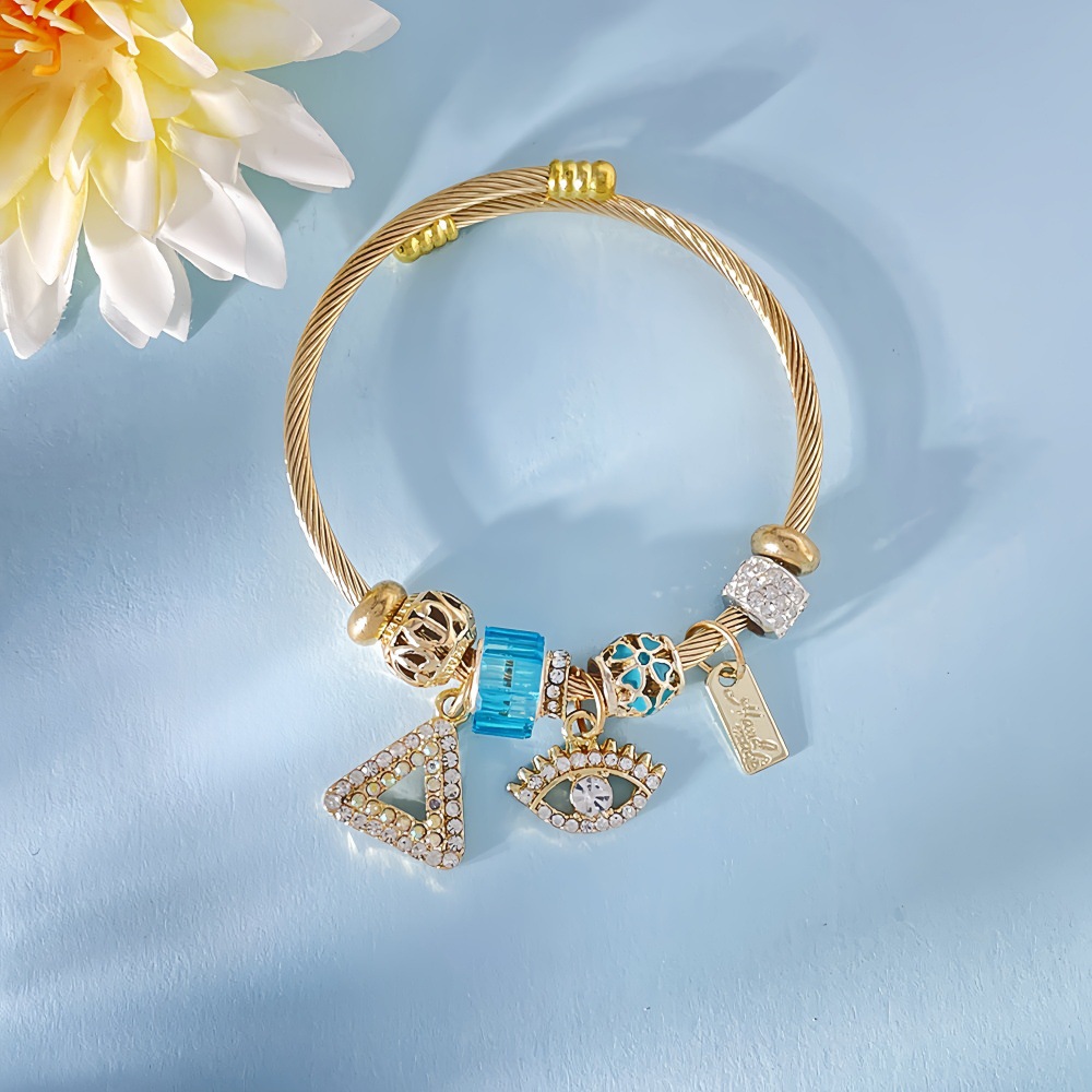 Bracelet en acier inoxydable et titane avec oeil du diable_voghion.com