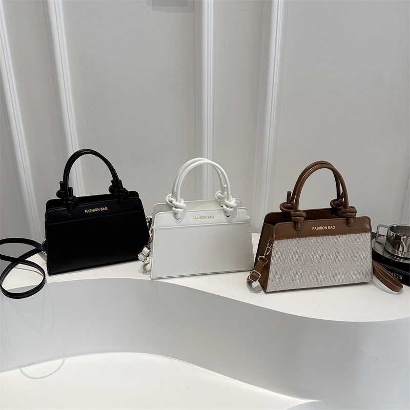 Bolso pequeño portátil retro estilo occidental mujer 2025 nuevo bolso cuadrado pequeño simple moda moda color contraste bolso de hombro