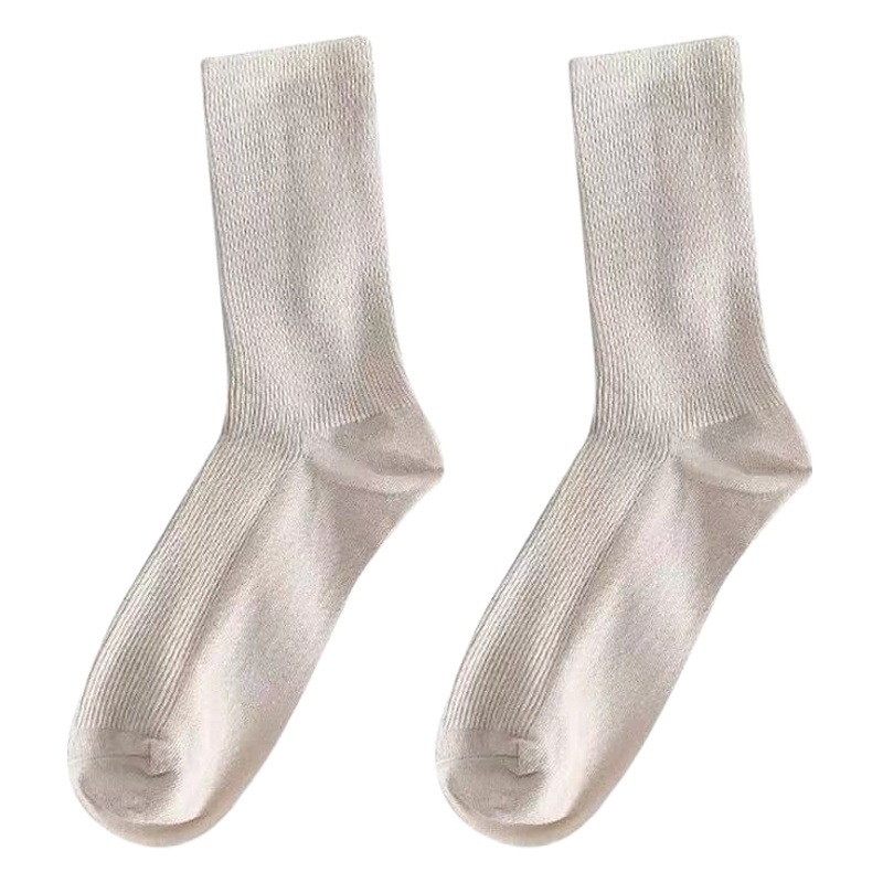 Four Seasons chica suave calcetines esenciales para niñas calcetines de pila de agujero medio de la pantorrilla ins moda simple Mori estilo universitario calcetines de color puro