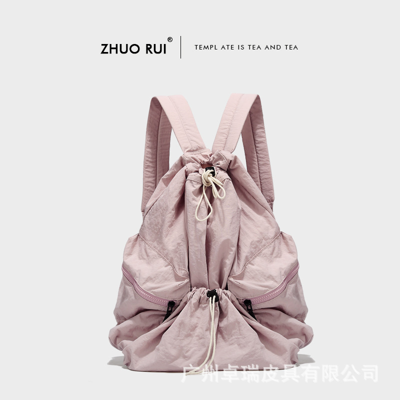 Corea del Sur Dongdaemun nuevo cordón mochila mujer casual gran capacidad estudiante mochila versátil mochila de nylon ligero