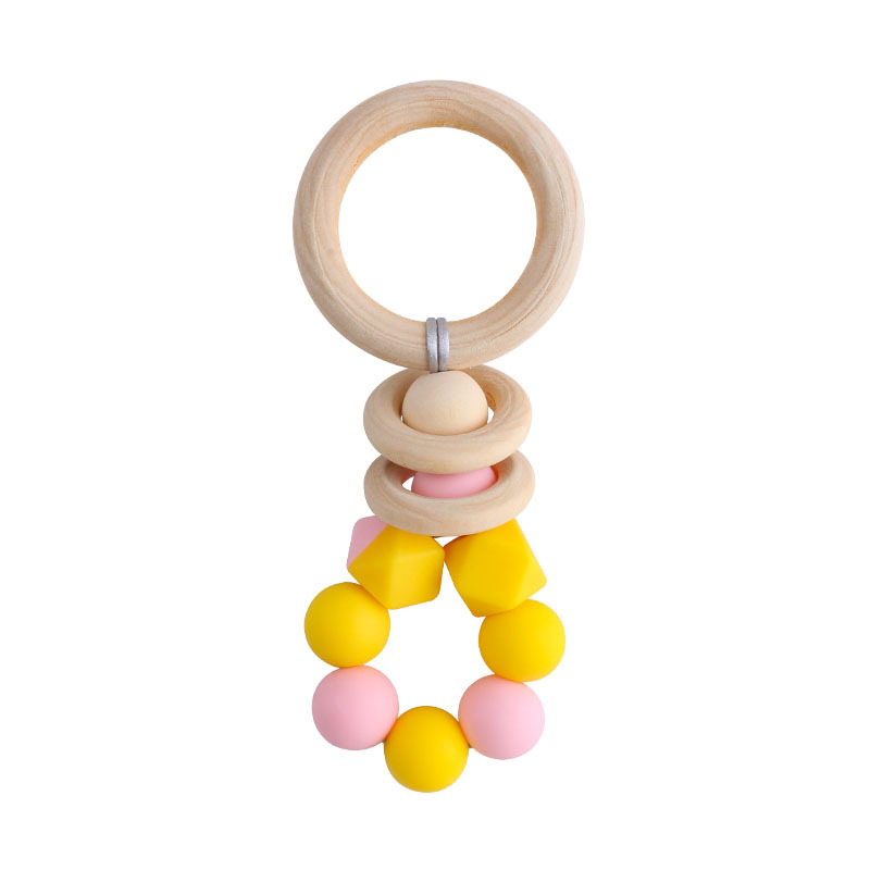 Nuevos suministros para bebés DIY creativo anillo de madera mordedor bebé calmante de dos colores de silicona de juguete dientes de molienda palo