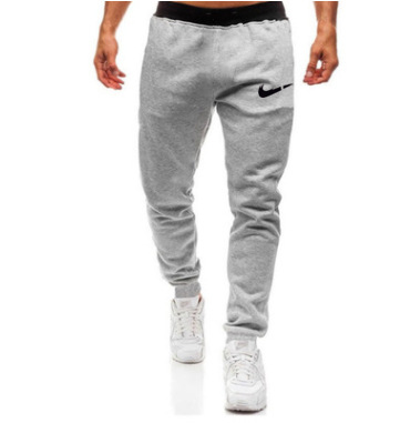 2024 Comercio exterior europeo y americano estilo grueso más terciopelo estampado de hombre pantalones casuales pies pantalones de entrenamiento pantalones deportivos