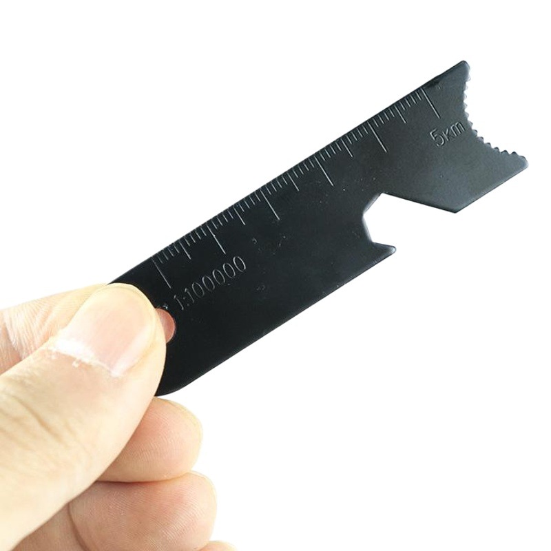 Supervivencia al aire libre multi-funcional al aire libre EDC equipo Flint raspador Especial británico Regla de medición abridor de botellas