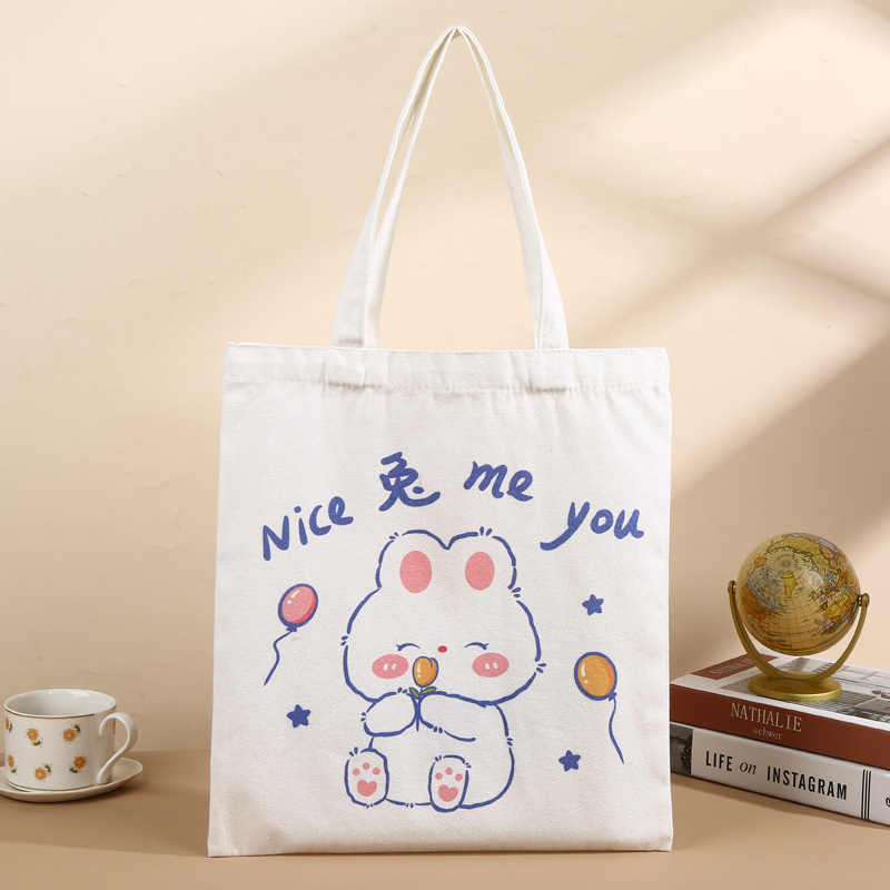 Bolsa de lona portátil personalizada ins Sensación avanzada Bolsa de lona en blanco de un solo hombro Escuela intensiva Impresión de logotipo publicitario