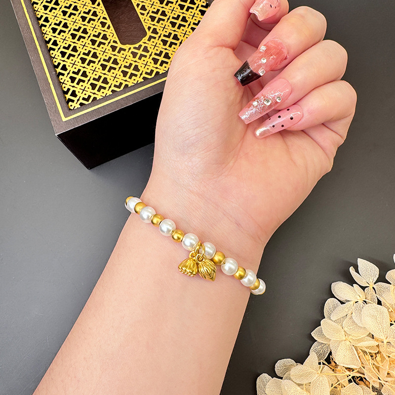 Pulsera de loto de oro de Gufa Sha imitación de perlas de aleación de cobre esferas ligeras de lujo Yiwu joyería suministro directo al por mayor