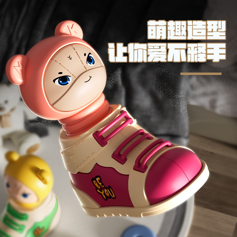 Los juguetes para niños presionan los zapatos de dibujos animados que se pueden cargar con azúcar, se pueden devolver a la inercia, los juguetes educativos, los puestos de regalos, los puestos al por mayor