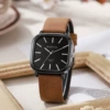 Коричневый ремешок, чёрный корпус, чёрный циферблат