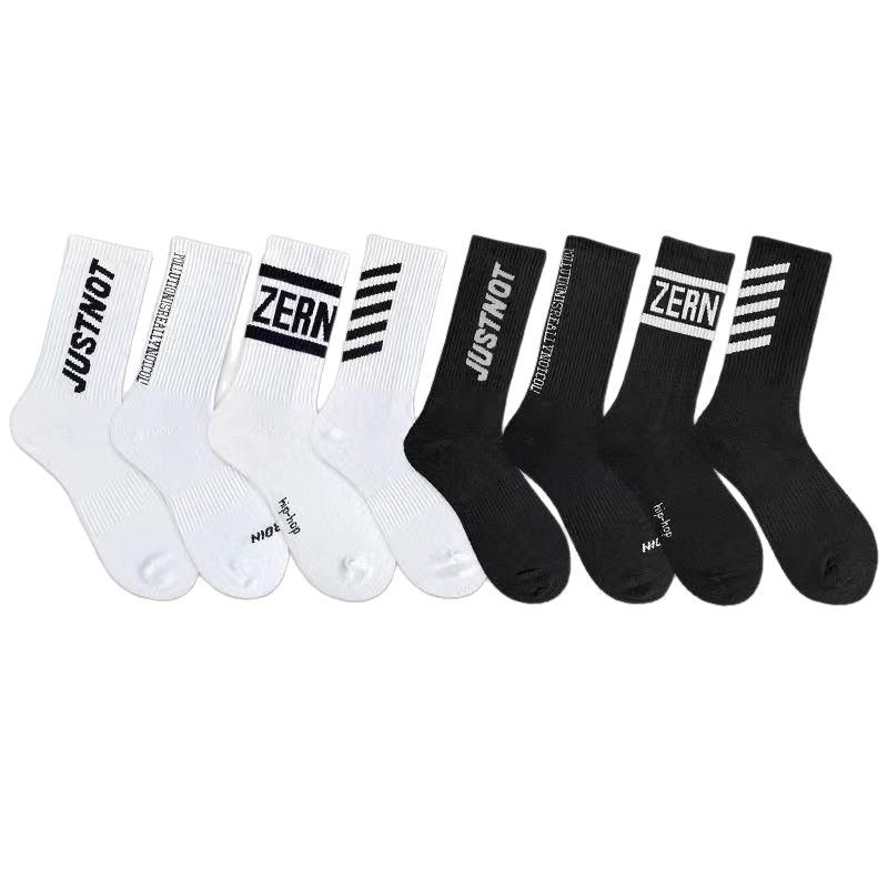 Calcetines de primavera y otoño para hombres calcetines de media pantorrilla medias desodorantes transpirables casuales versátiles letras de moda estudiante baloncesto calcetines deportivos