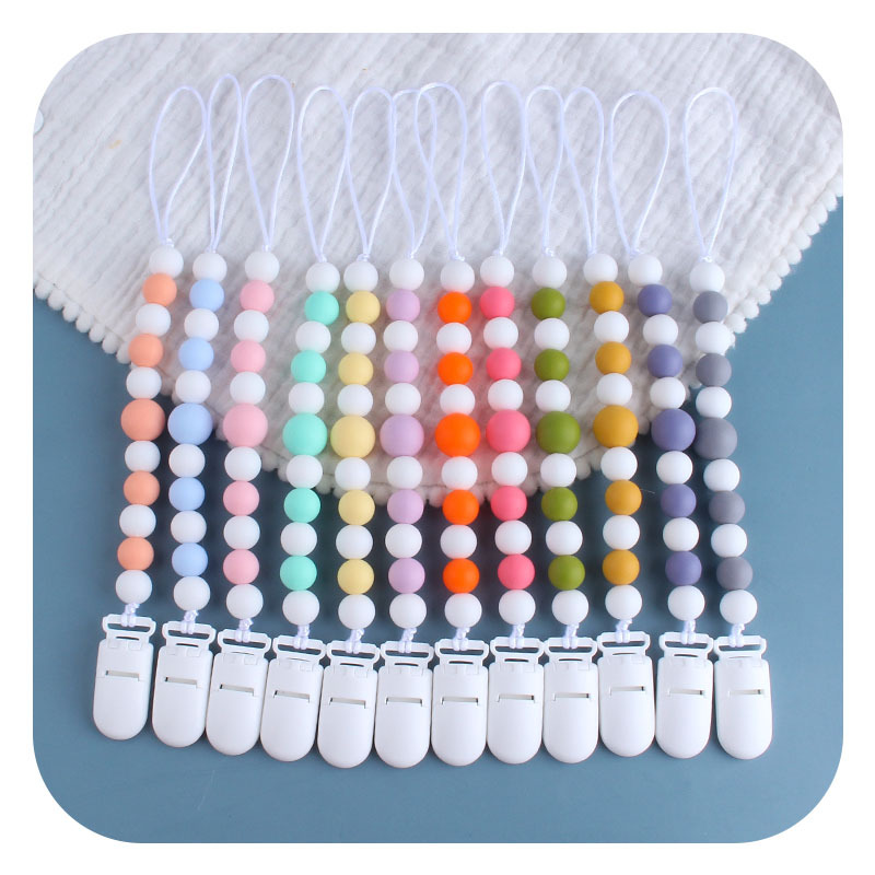 Nuevos suministros para bebés clip de pico de pato de plástico cuentas de silicona mordedor bebé juguetes molares chupete cadena anti-caída cadena