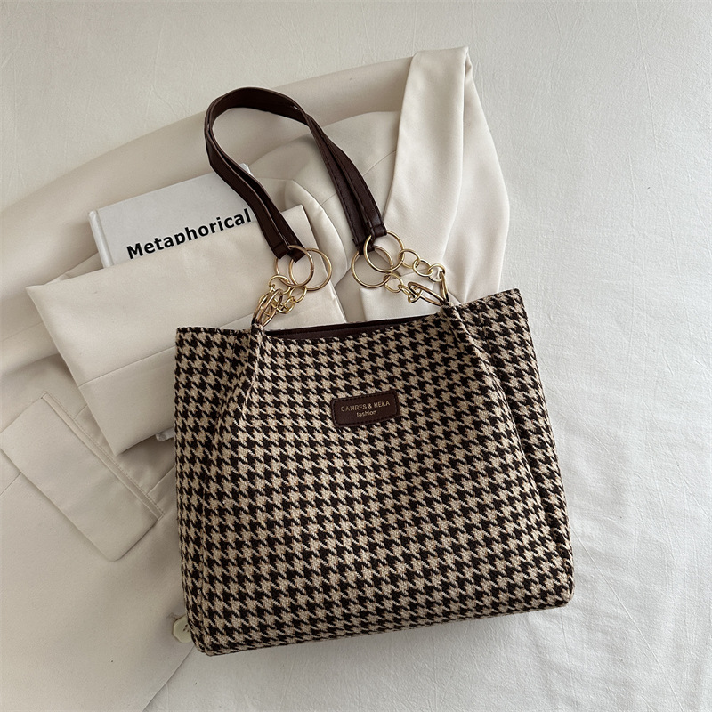 Bolsas retrógradas coreanas de mujeres 2024 otoño nuevo paquete de brazo de viaje de gran capacidad bolsas de hombro