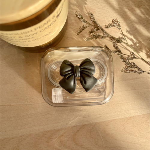 Three-dimensional bow contact lens box, no need to twist the lid, compact transparent contact lens companion box, leak-proof double box