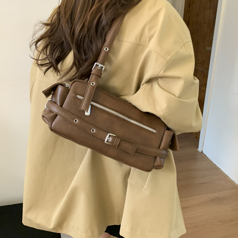 Bolso de viaje coreano para mujeres 2025 nuevo otoño invierno de alta sensación de hombro bolso de braza retro versátil bolso de mano
