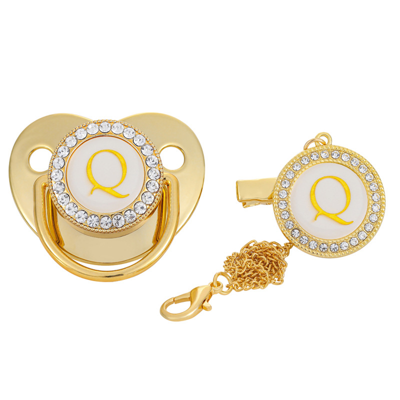 Venta directa de fábrica para niños chupete dorado destete artefacto bebé chupete boca letras A- Z